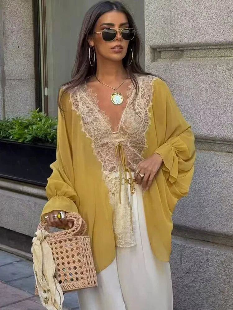 Blouse en dentelle à manches lanterne – Femme